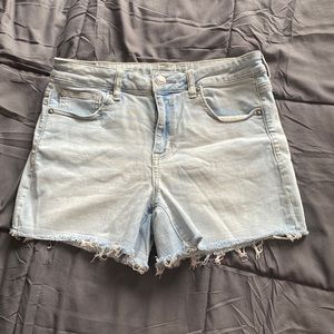 Light Wash American Eagle Jean Shorts with Frayed Bottoms